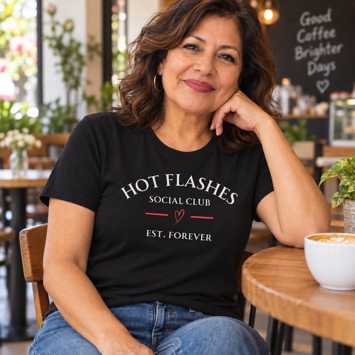 Latin American woman in her 50s wearing the Hot Flashes Est. Forever Tee