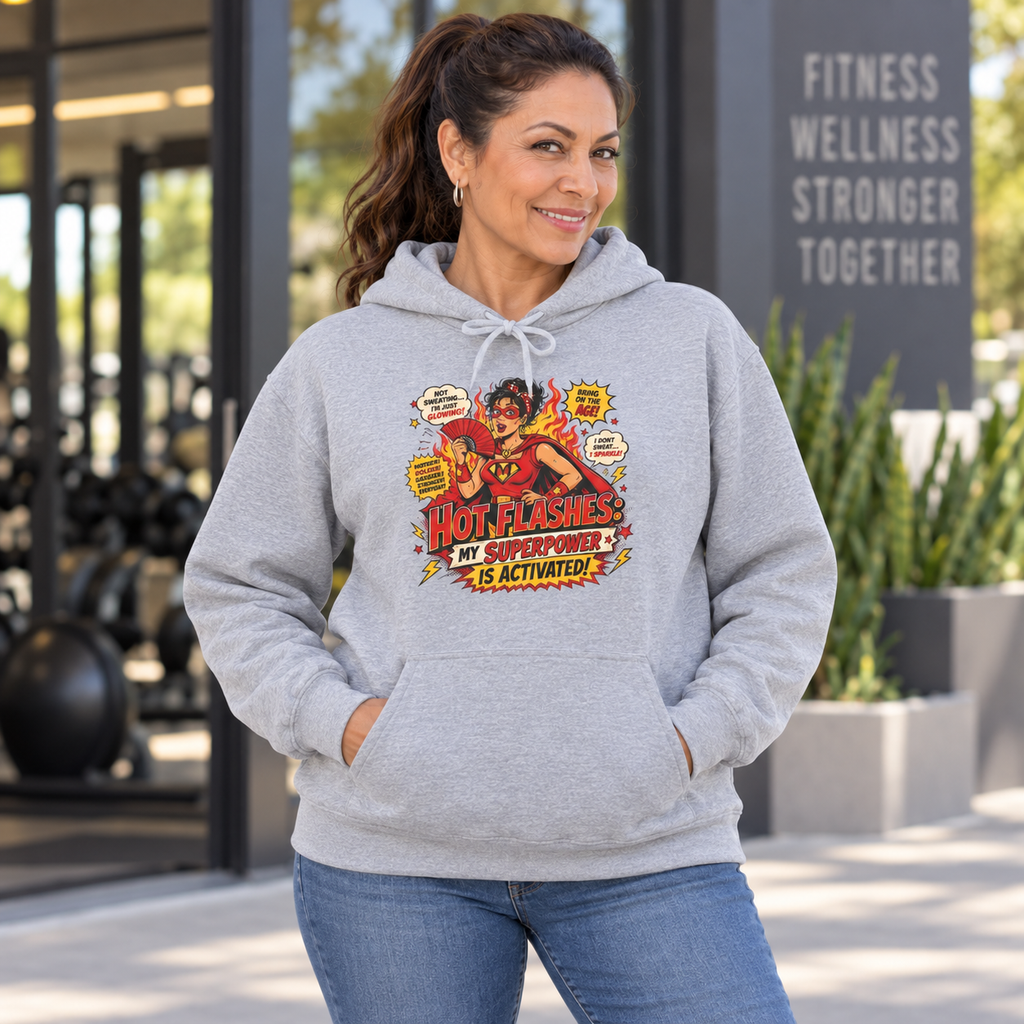 Latina woman in her 50s modelling the Hot Flashes My Superpower Is Activated DTF hoodie