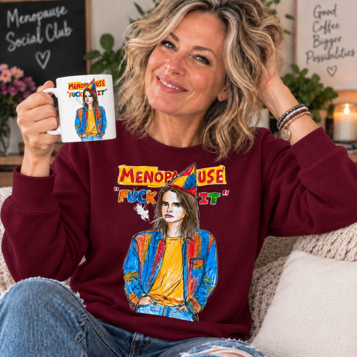Maroon — blonde woman in her 50s wearing Menopause Fuck It sweatshirt