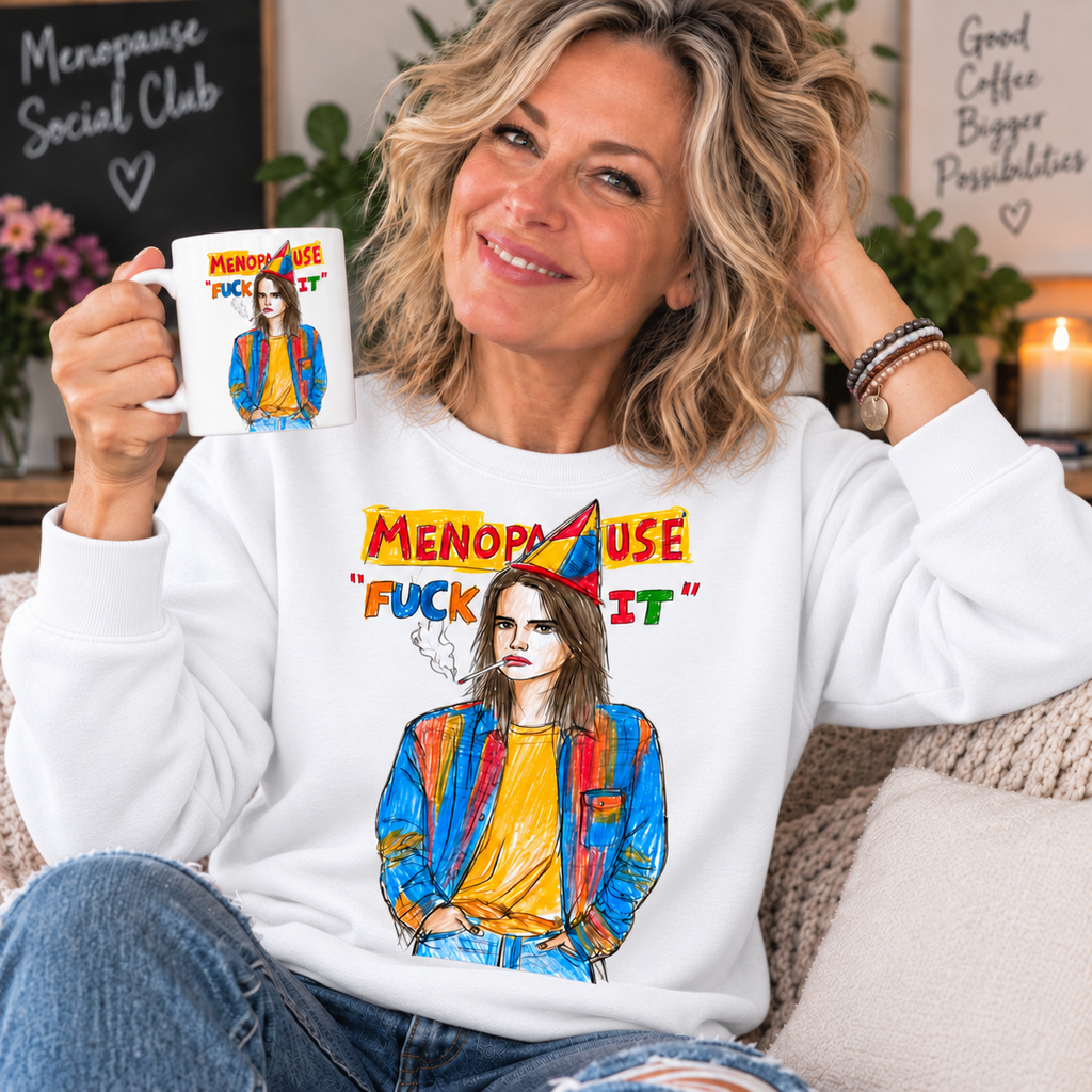 White — blonde woman in her 50s wearing Menopause Fuck It sweatshirt