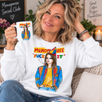 White — blonde woman in her 50s wearing Menopause Fuck It sweatshirt