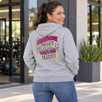 Latina woman in her 50s wearing the Menopause Is My Superpower grey hoodie, back view