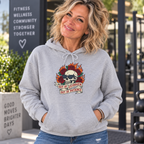 Blonde woman in her 50s modelling the Out of Estrogen Out of Patience DTF hoodie