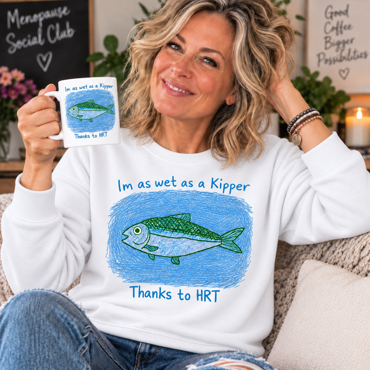 White — blonde woman in her 50s wearing Wet as a Kipper sweatshirt